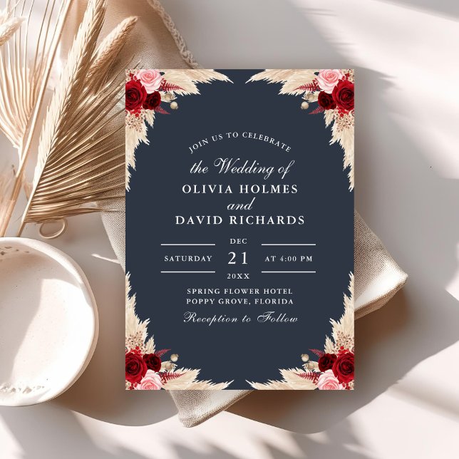 Convite para casamento de Rosas tropicais azuis (Midnight Blue Tropical Roses Wedding Invitation on a boho table with dry palm leaf.)