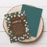 Convites Casamento Rustic Eucalyptus e Brown Wood<br><div class="desc">Este convite de casamento rústico mostra folhas de eucalipto com as palavras "casamento" em trendy script tudo contra um fundo de madeira marrom na frente e uma cor verde-rosa escura na parte de trás. Personalize-o substituindo o texto do marcador de posição. Para obter mais opções, como alterar a fonte, seu...</div>