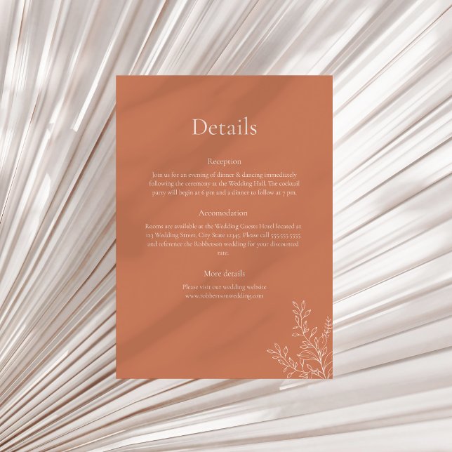 Convites Dark Terracotta Botanical Details Card (Dark Terracotta Botanical Details Card on a sunny neutral dry palm leaf.)