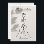 Convites Minimalist Rose Line Art Wedding Invitation<br><div class="desc">A sophisticated and modern wedding invitation featuring a delicate single rose line art illustration held by hands. Designed with a stylish leaf shadow overlay on a warm cream background. This minimal layout features elegant serif typography above and below the art, perfect for fine art or boho-chic weddings. Fully customizable template....</div>