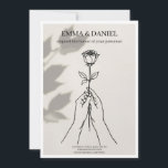 Convites Minimalist Rose Line Art Wedding Invitation<br><div class="desc">A sophisticated and modern wedding invitation featuring a delicate single rose line art illustration held by hands. Designed with a stylish leaf shadow overlay on a warm cream background. This minimal layout features elegant serif typography above and below the art, perfect for fine art or boho-chic weddings. Fully customizable template....</div>