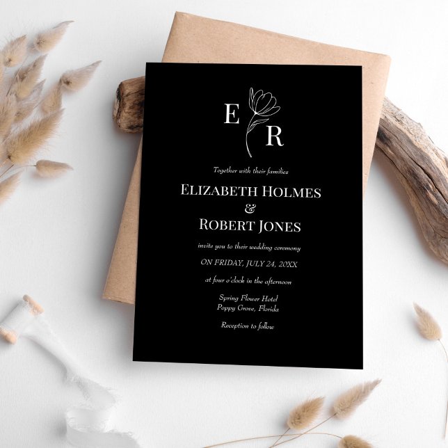 Convites Monograma Floral Preto Moderno de Casamento (Modern Black Floral Monogram Wedding Invitation on white table with neutral boho decoration.)