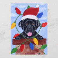 Natal preto do papai noel do filhote de cachorro