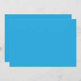 Convites um fundo azul com um gato preto e branco