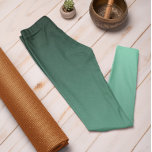 Cor de Tendência do Outono - Leggings de Ombro Ver<br><div class="desc">As leggings verdes sutis de ombre, na moda Mcil, da nossa coleção de cores de tendência Autumn e Winter 2023/24 oferecem charme de eterno. Estas Leggings em forma de "Ombre Cyan Leggings" apresentam um gradiente, desaparecendo do escuro no topo para a cor mais clara/mais clara nas pernas. Estas leggings de...</div>