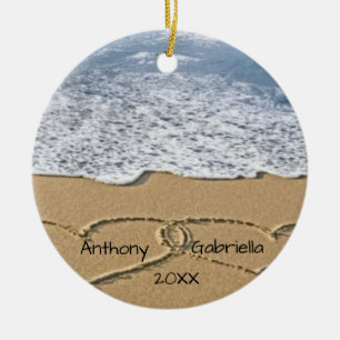 Corações personalizados no ornamento da areia