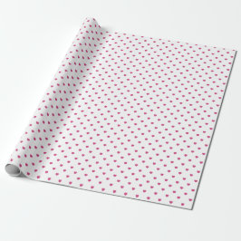 Corações rosa em papel de embrulho branco