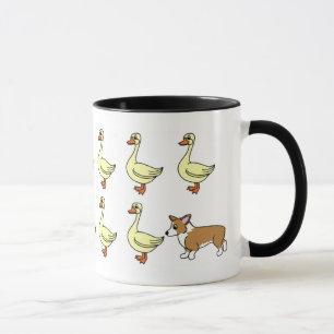 Corgi de Galês do Pembroke que reune a caneca dos