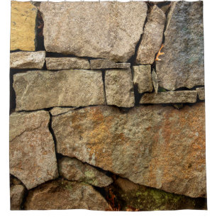 Cortina Para Box A stone wall made of cobblestones background textu