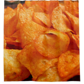Cortina Para Box Close up of juicy, crispy, chips on black plate.