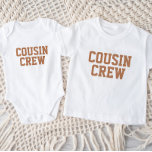 Cousin Crew | Rust Kids Baby T-Shirt<br><div class="desc">Roupa personalizado impresso personalizado com gráfico "Cousin Crew" ou outro texto personalizado. Use as ferramentas de design para editar as fontes de texto e as cores ou adicionar suas próprias fotos para criar um design de camiseta personalizada. Selecione entre uma grande variedade de t-shirts, camisolas-cisterna e camisas para homens, mulheres,...</div>