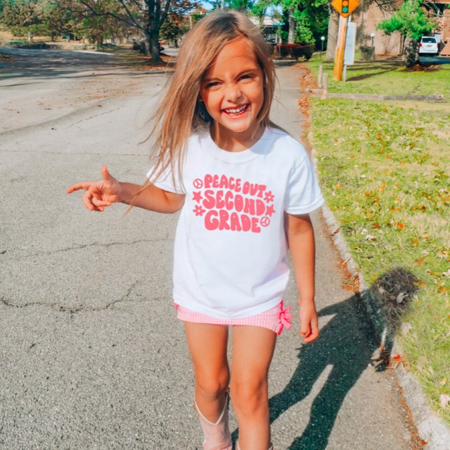 Crianças apaziguam camisa do segundo grau em cor-d (Criador carregado)