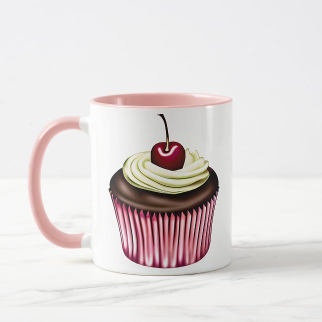 Cupcake de chocolate com uma cereja na caneca supe (Esquerda)
