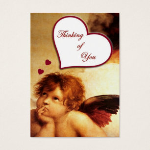 Cupido pensando em sua etiqueta do presente