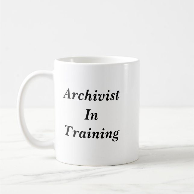 De Café Arquivista na caneca do treinamento (Esquerda)