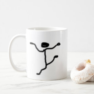 De Café caneca com uma pequena figura