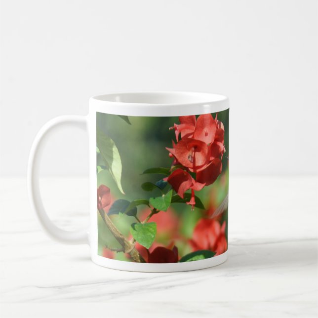De Café Caneca do colibri em vôo (Esquerda)