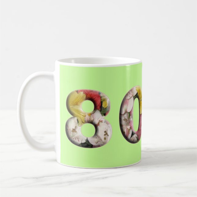 De Café caneca do marco miliário do aniversário do (Esquerda)