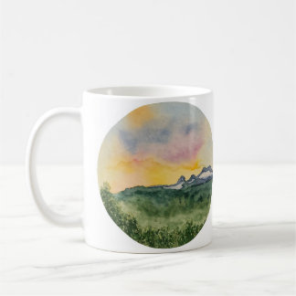 De Café Caneca do por do sol da montanha
