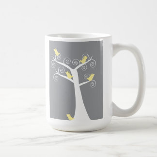 De Café Cinco aves amarelas numa caneca