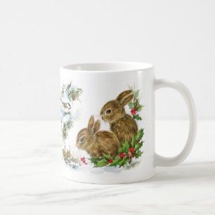 De Café Coelhos e pássaros do inverno na caneca do Natal