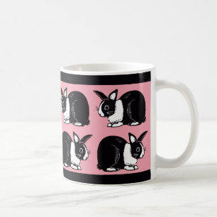 De Café Coelhos preto e branco cor-de-rosa e caneca preta