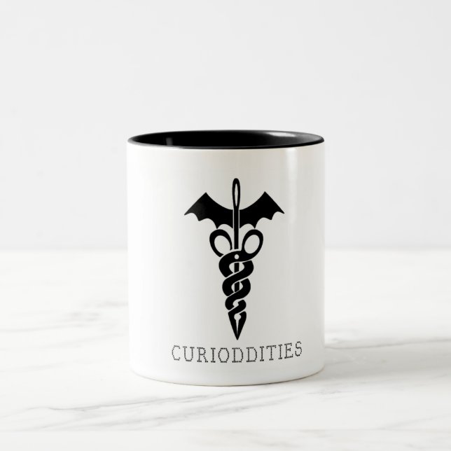 De Café Em Dois Tons Sew a caneca do design do Caduceus do Couture (Centro)