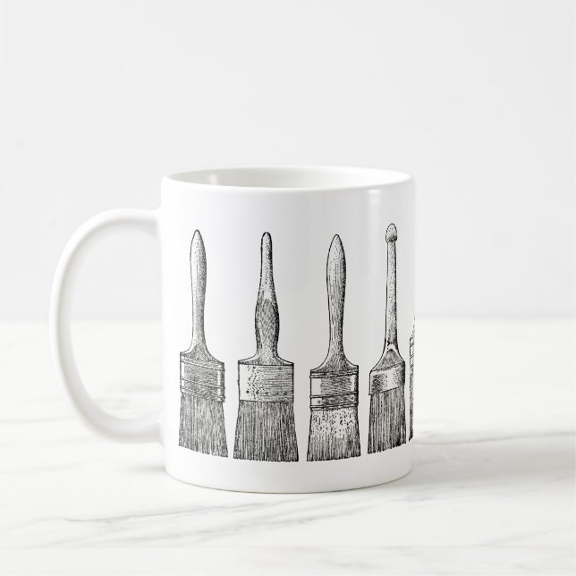 De Café Escovas do verniz dos pintores na caneca (Esquerda)
