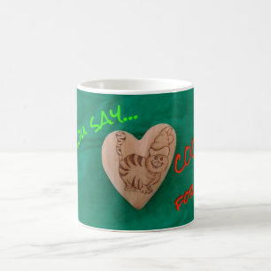 De Café Gato do papai noel que procura a caneca dos