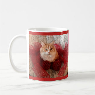 De Café Gato macio e caneca vermelha da fita