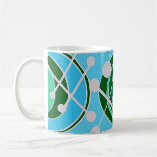 De Café Geoformas em verde e azul com caneca branca