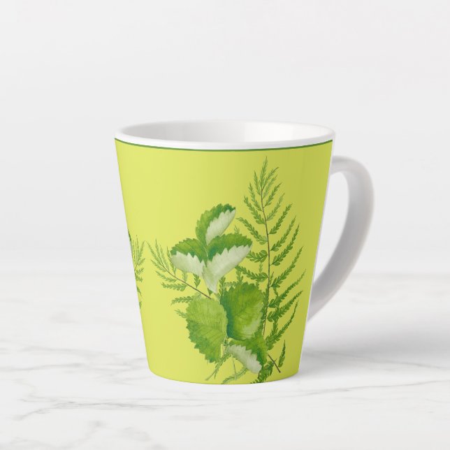 De Café Latte Formulários em verde numa pequena caneca latina (Ângulo direito)