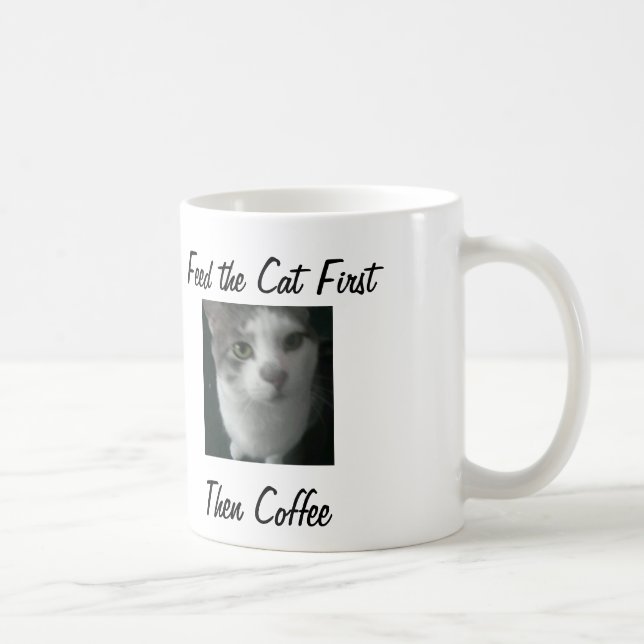 De Café O amigo com fome diz… Alimente a primeira caneca (Direita)