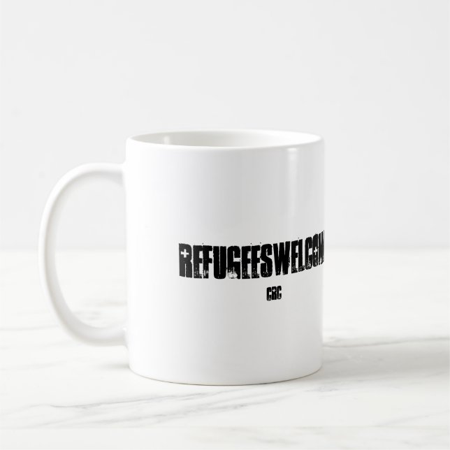 De Café Os refugiados dão boas-vindas à caneca (Esquerda)