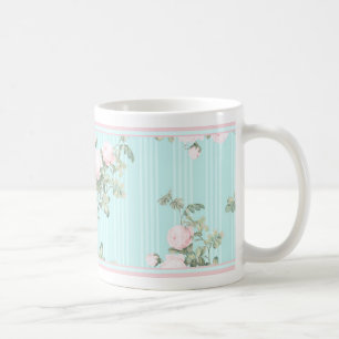 De Café Rosas cor-de-rosa e cor-de-rosa da caneca floral