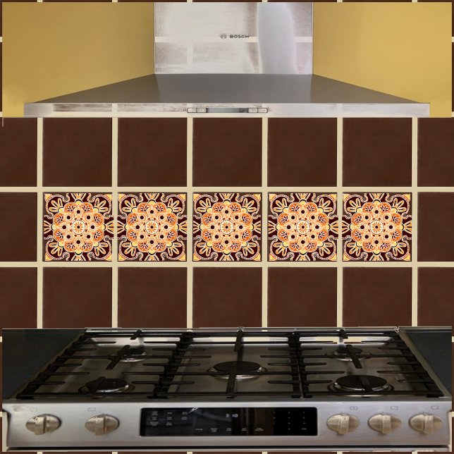 De Cerâmica Azulejo cerâmico com castanho geométrico, ouro e l (Orange and brown geometric tile shown on a kitchen backsplash with brown field tiles.)
