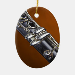 De Cerâmica Clarinete com o ornamento Dourado do fundo