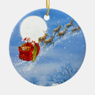 De Cerâmica Papai noel com seu ornamento da rena do vôo