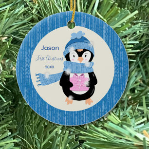 De Cerâmica Penguin Segurando O Ornamento Do Bebê Presente