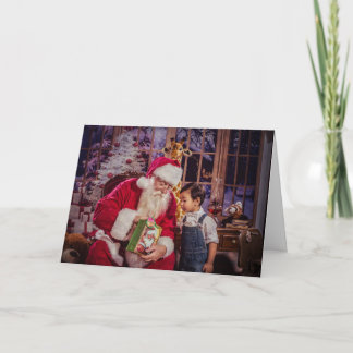 De Festividades Cartão do Natal com papai noel e menino