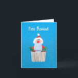 De Festividades O cartão espanhol do papai noel do Natal "cupcake<br><div class="desc">Um cartão de Natal espanhol feito sob medida menor com papai noel sobre um cupcake, de uma colagem de papel pintado à mão por Judy Adamson. Contacte-me por favor através de minha loja se você gostaria do texto da capa mudado e o interior é deixado vazio para sua própria mensagem....</div>