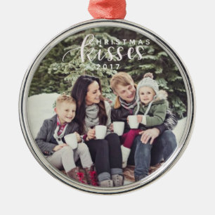 De Metal O Natal beija o ornamento