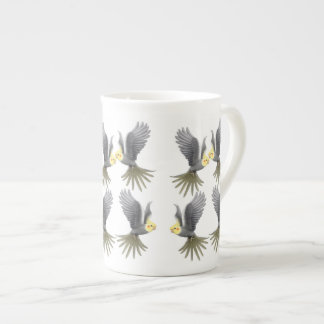 De Porcelana O Cockatiel do vôo repete mecanicamente a caneca