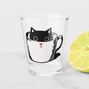 De Shot Gato preto com nariz vermelho escondido em um copo