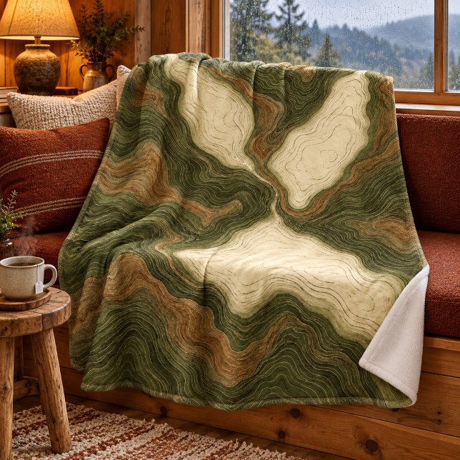 De Velo Cobertor Contour Valley (30 x 40 inch fleece blanket. Printed front, plain white back. Styled scene; props not included.)