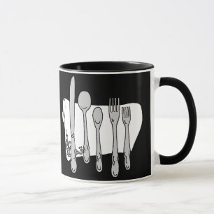 Dinnerware preto e branco na caneca preta de café
