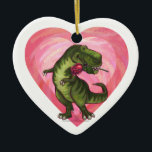 Dinossauro com Ornamento do Rosa Be Mine<br><div class="desc">A decoração do coração do dinossauro, T-Rex, foi trazida para você pela Imagine isso! Design apresenta nosso dino Tyrannosaurus Rex original segurando uma rosa vermelha bonito em sua boca e parado diante de corações cor-de-rosa em camadas pintados digitalmente pelo ilustrador de livros de nossa criança talentosa, Traci Van Wagoner. A...</div>