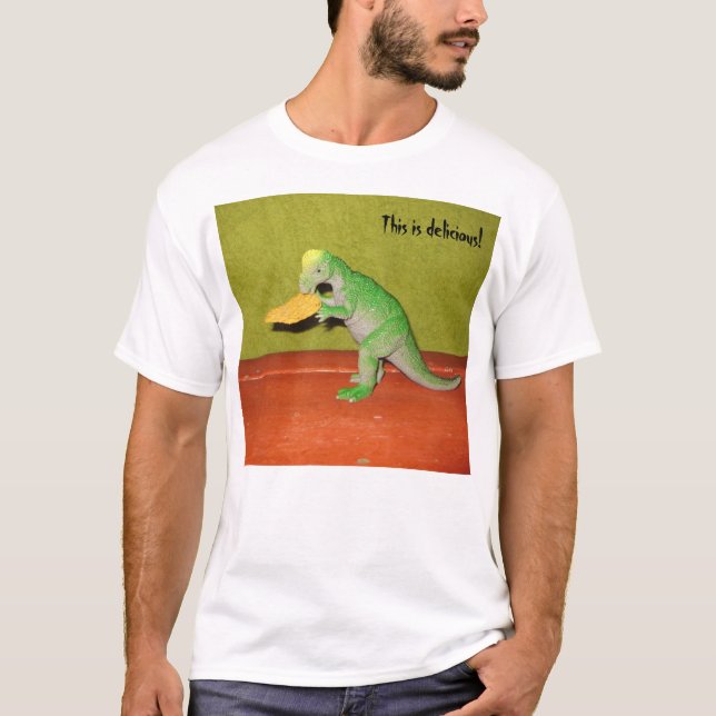 Dinossauro pré-histórico que come a camiseta da (Frente)