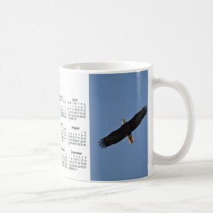 Do pássaro do calendário caneca 2014 de café