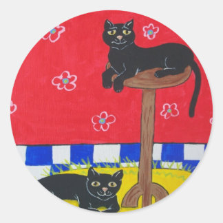 Dois adesivos de gatos pretos